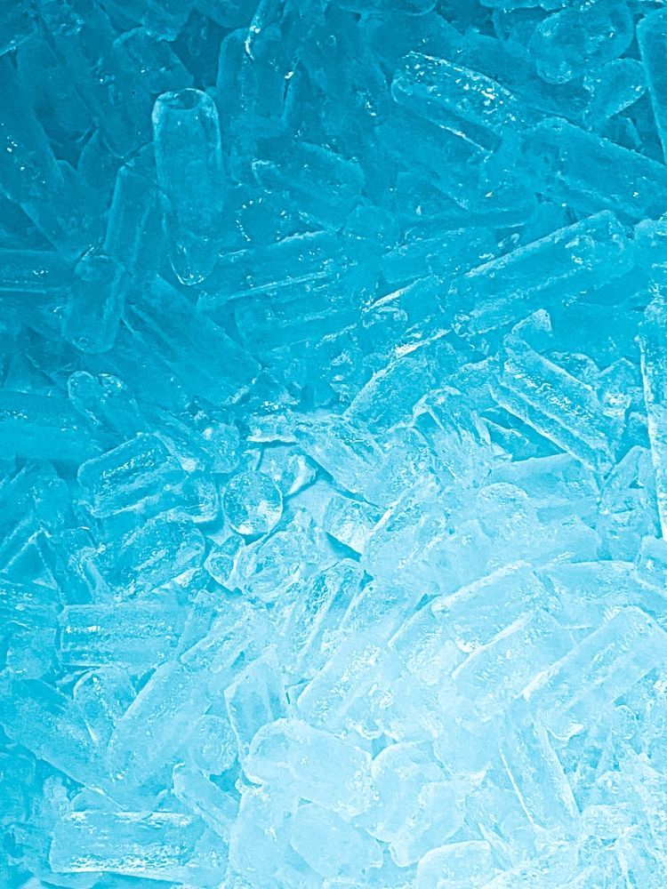 A Close-up View of Numerous Cylindrical Ice Cubes in Shades of Blue and White — Cool Blue Ice & Water in Taminda, NSW