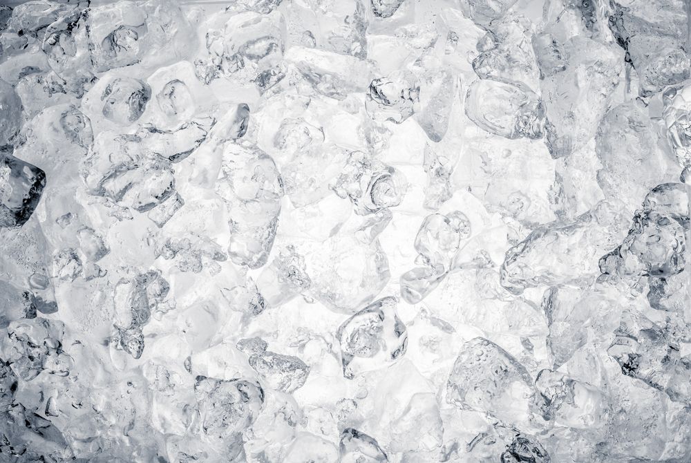 A Close-up View of Numerous Irregular, Translucent Ice Cubes Piled Together — Cool Blue Ice & Water in Taminda, NSW