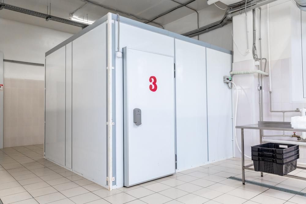 A White Walk-in Cooler Labeled With a Red Number 3 in a Bright — Cool Blue Ice & Water in Tamworth, NSW