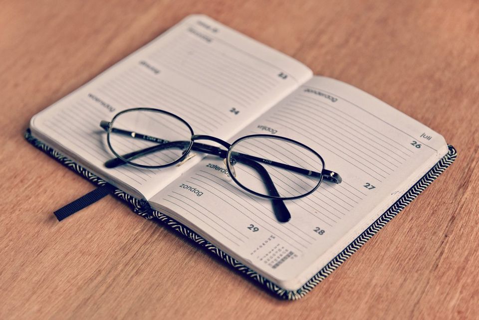 Eyeglasses on a Notebook | Manteca, CA | Legacy Local Impact