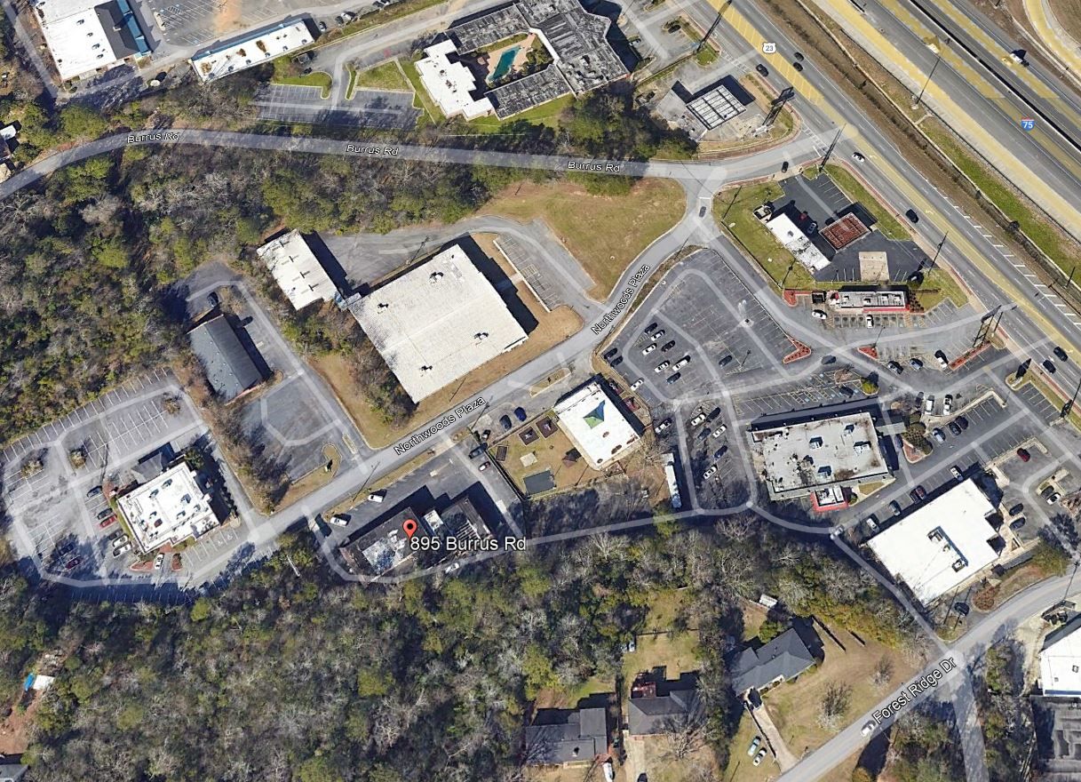 An aerial view of a residential area with lots of buildings