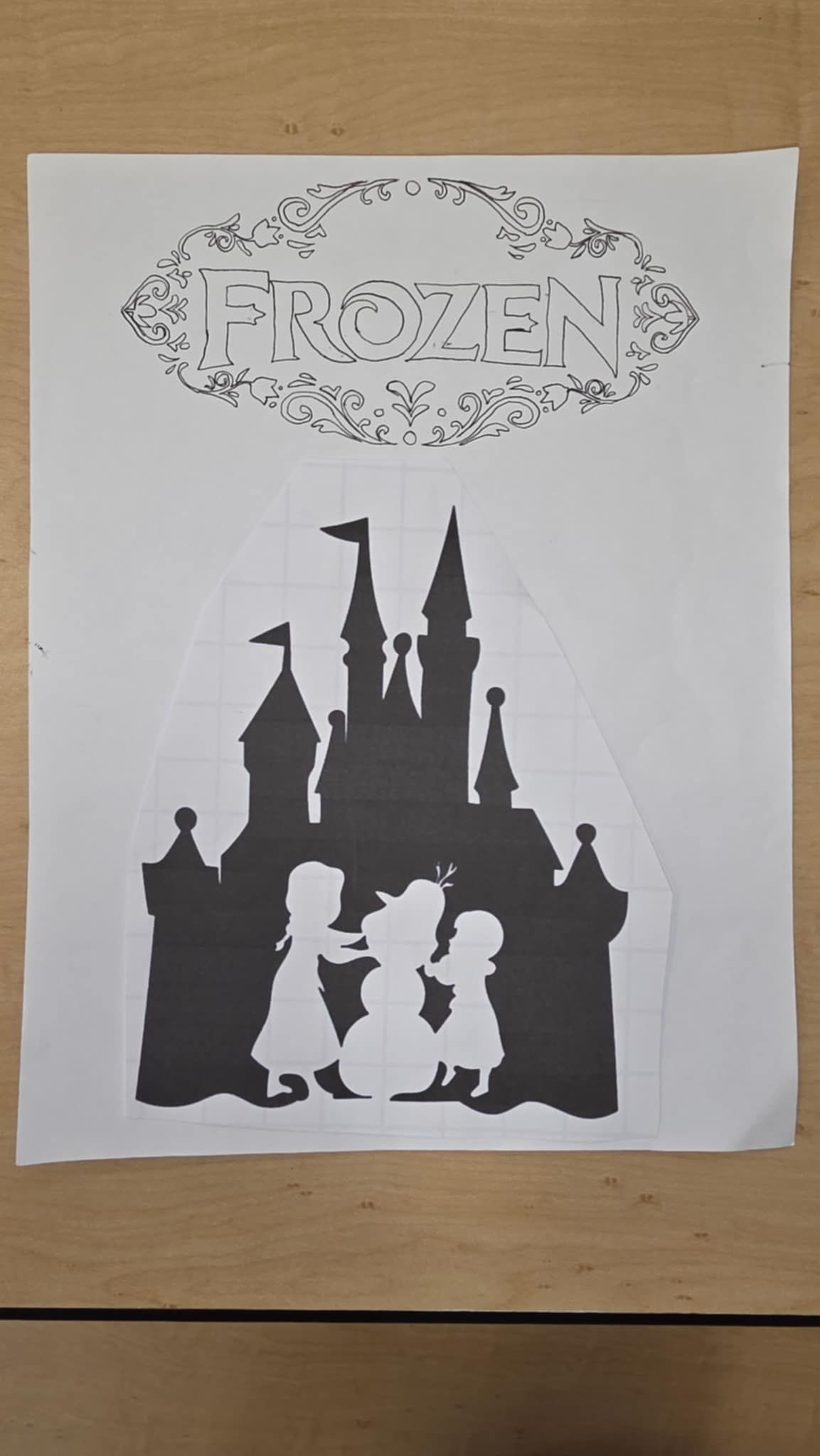 Frozen castle silhouette with characters and title text.