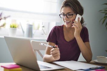 Lady Doing some work — telephone support in Quincy, MA