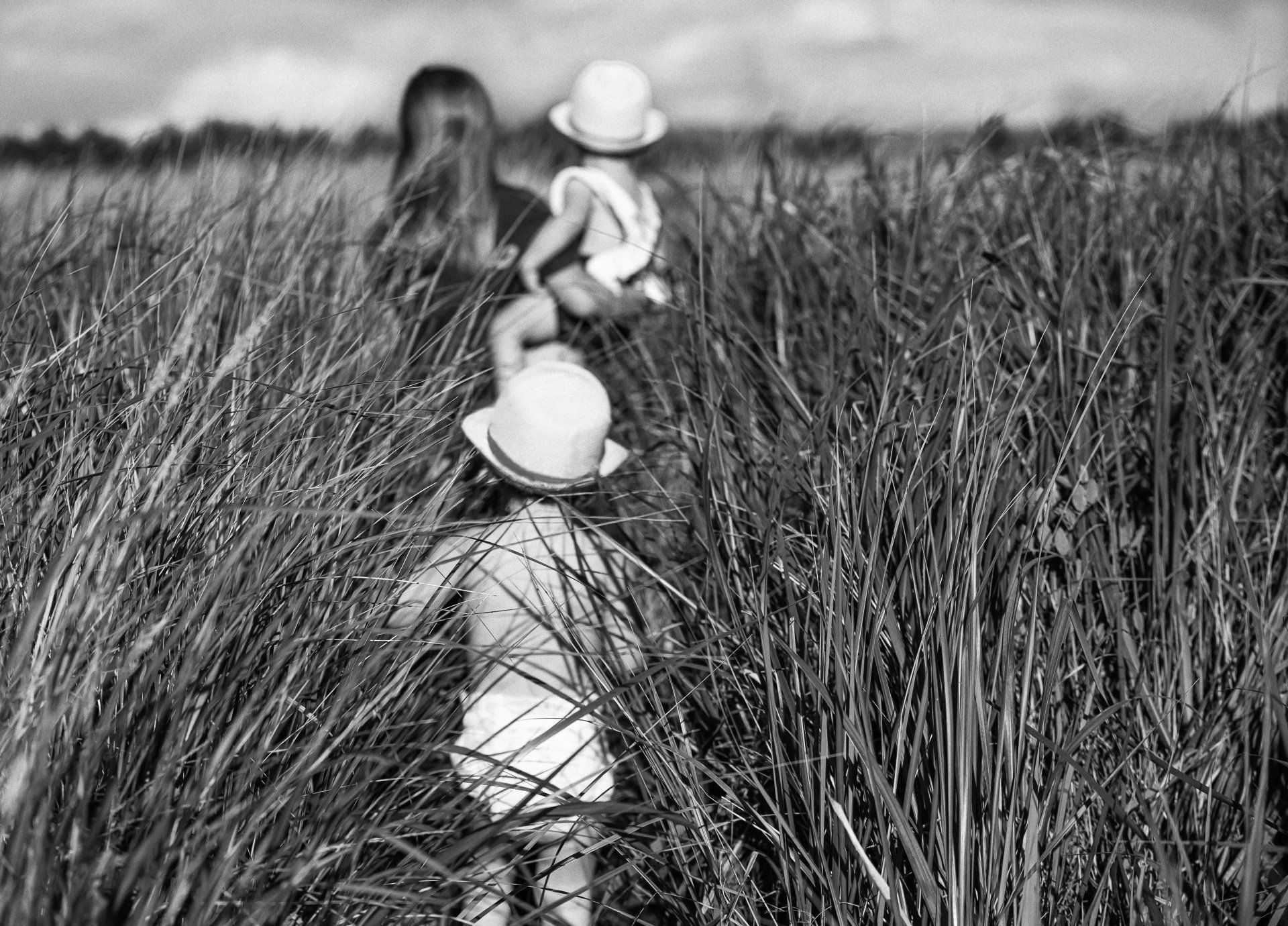Natalie-DAngelo-Photography-Vancouver-BC-Canada-BlackWhite-Family-Portraits-Visual-Storyteller-young-girls-walking-grass