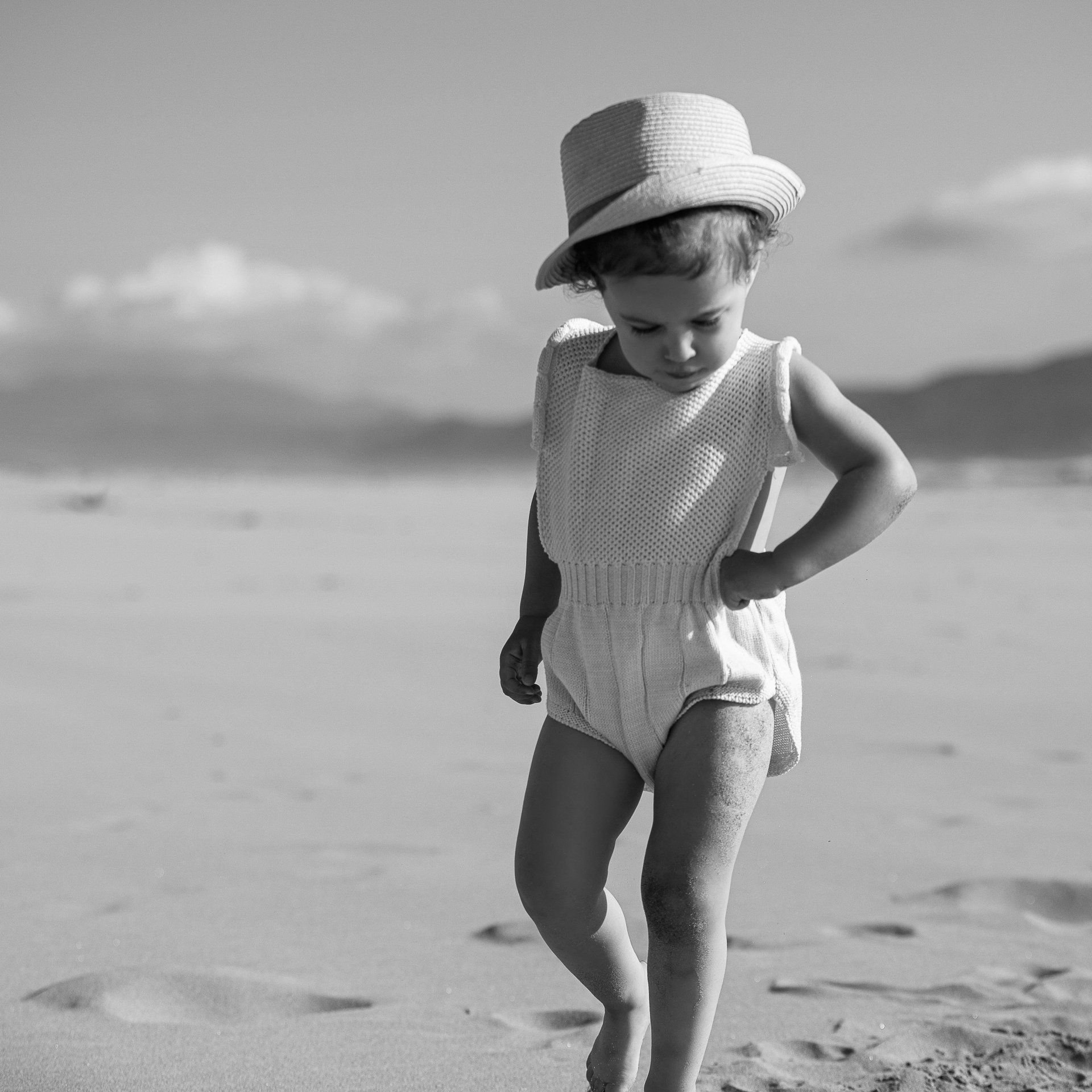 Natalie-DAngelo-Photography-Vancouver-BC-Canada-BlackWhite-Family-Portraits-Visual-Storyteller-young-girl-walking-beach