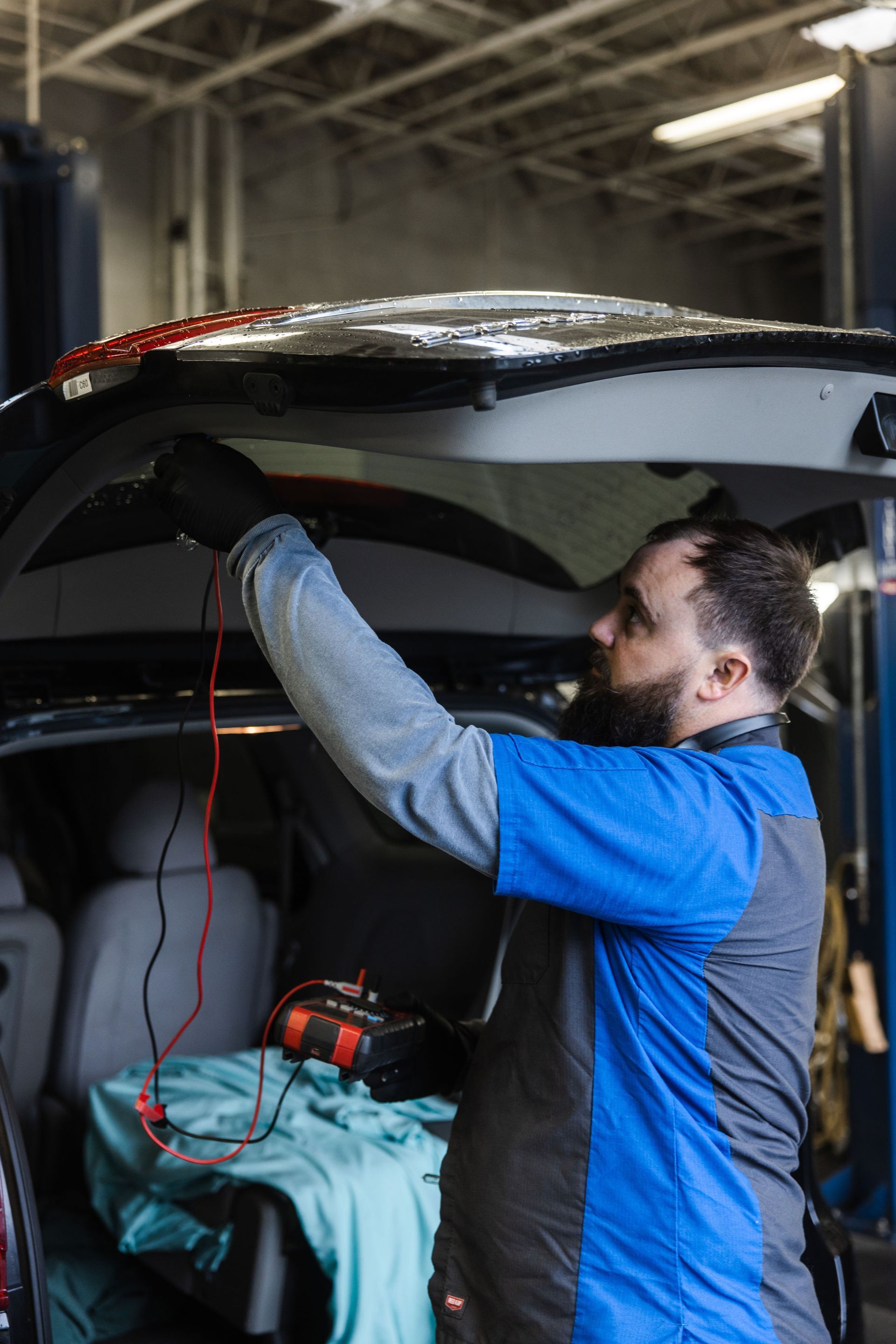 Our Technician Checks Vehicle - Electric Laboratories Complete Car Care