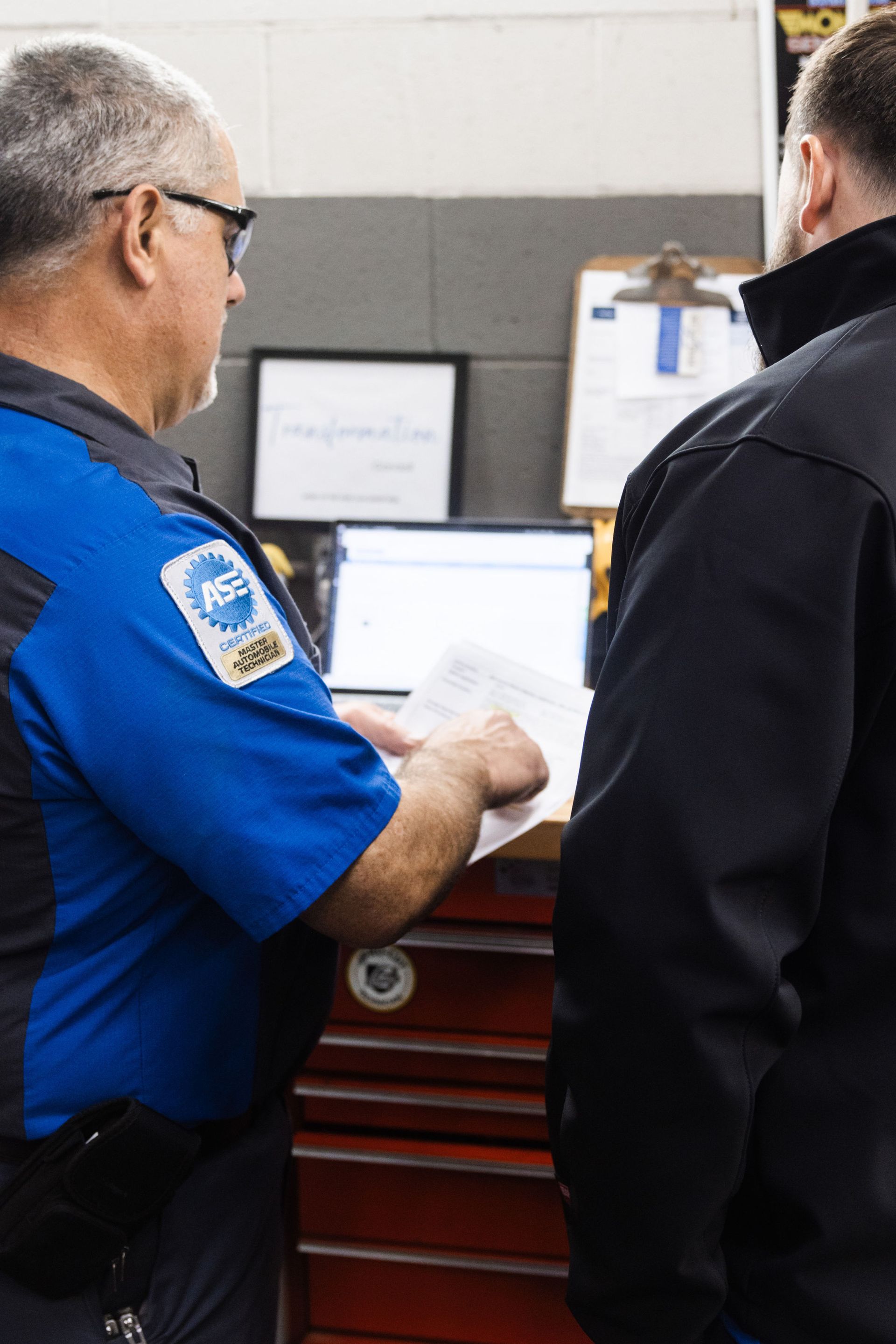 Our Staff Diagnosis a Car 