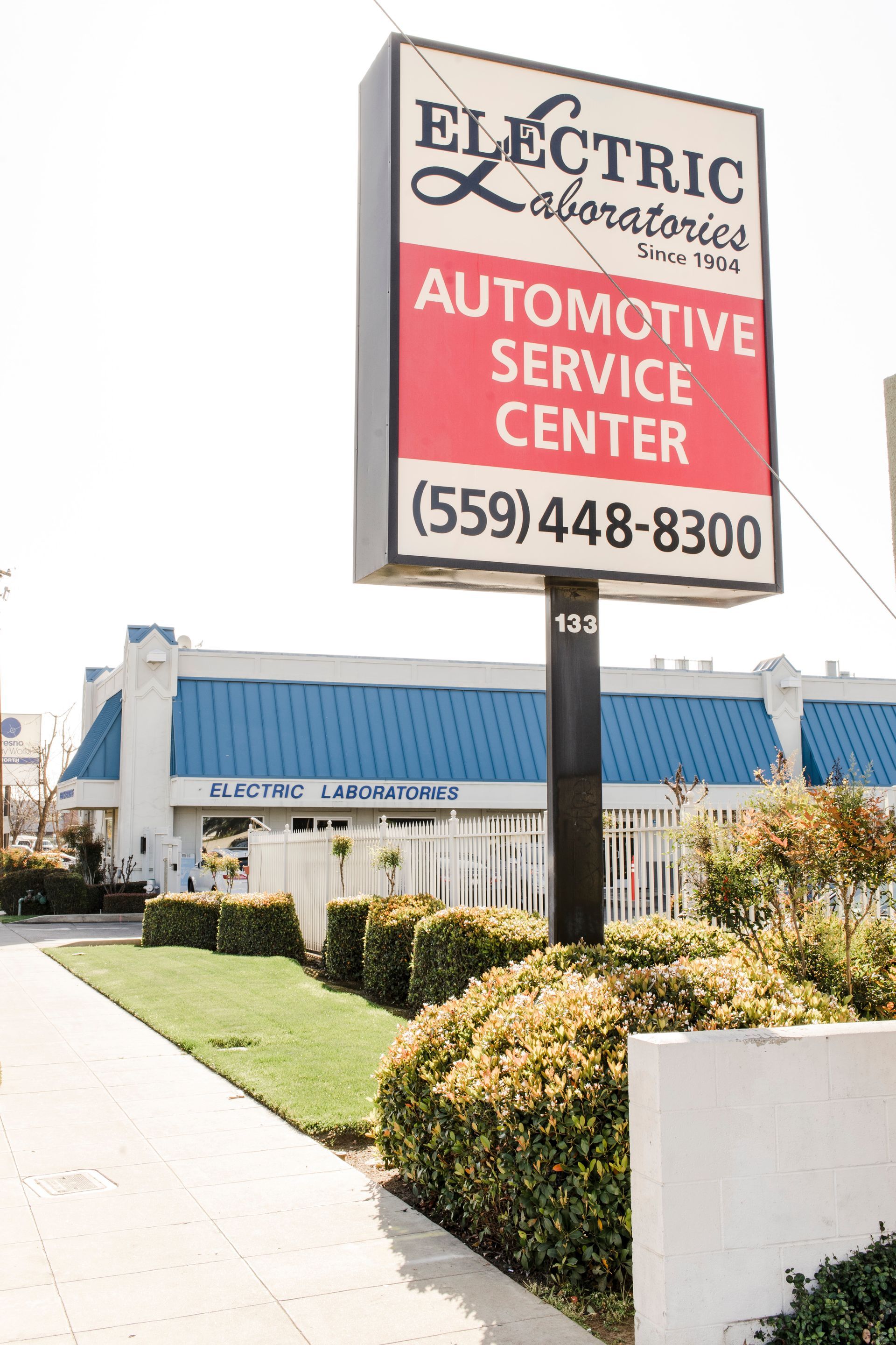 The Sign of Electric Laboratories Complete Car Care