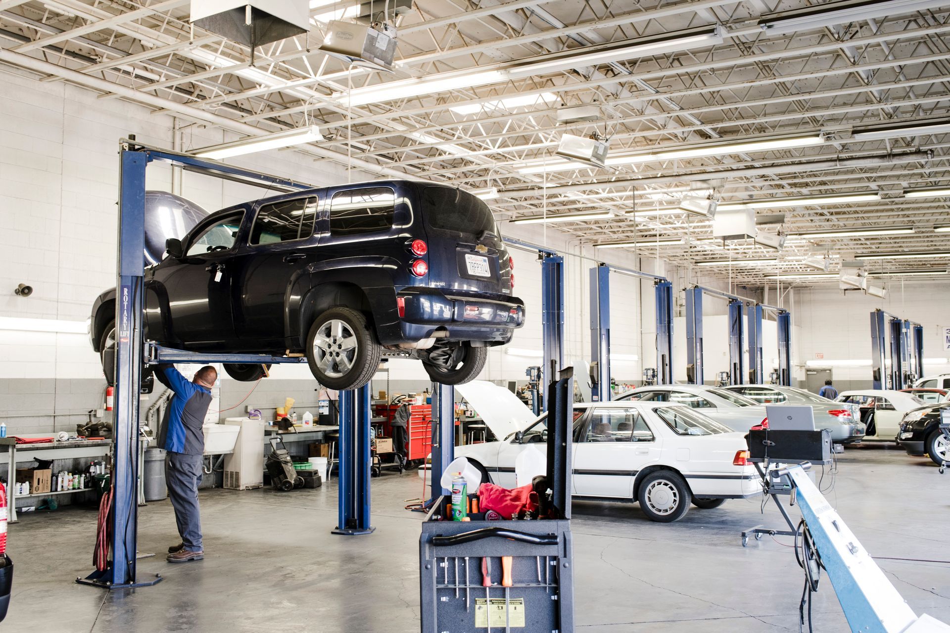 Vehicle on a Lift in Fresno, CA - Electric Laboratories Complete Car Care