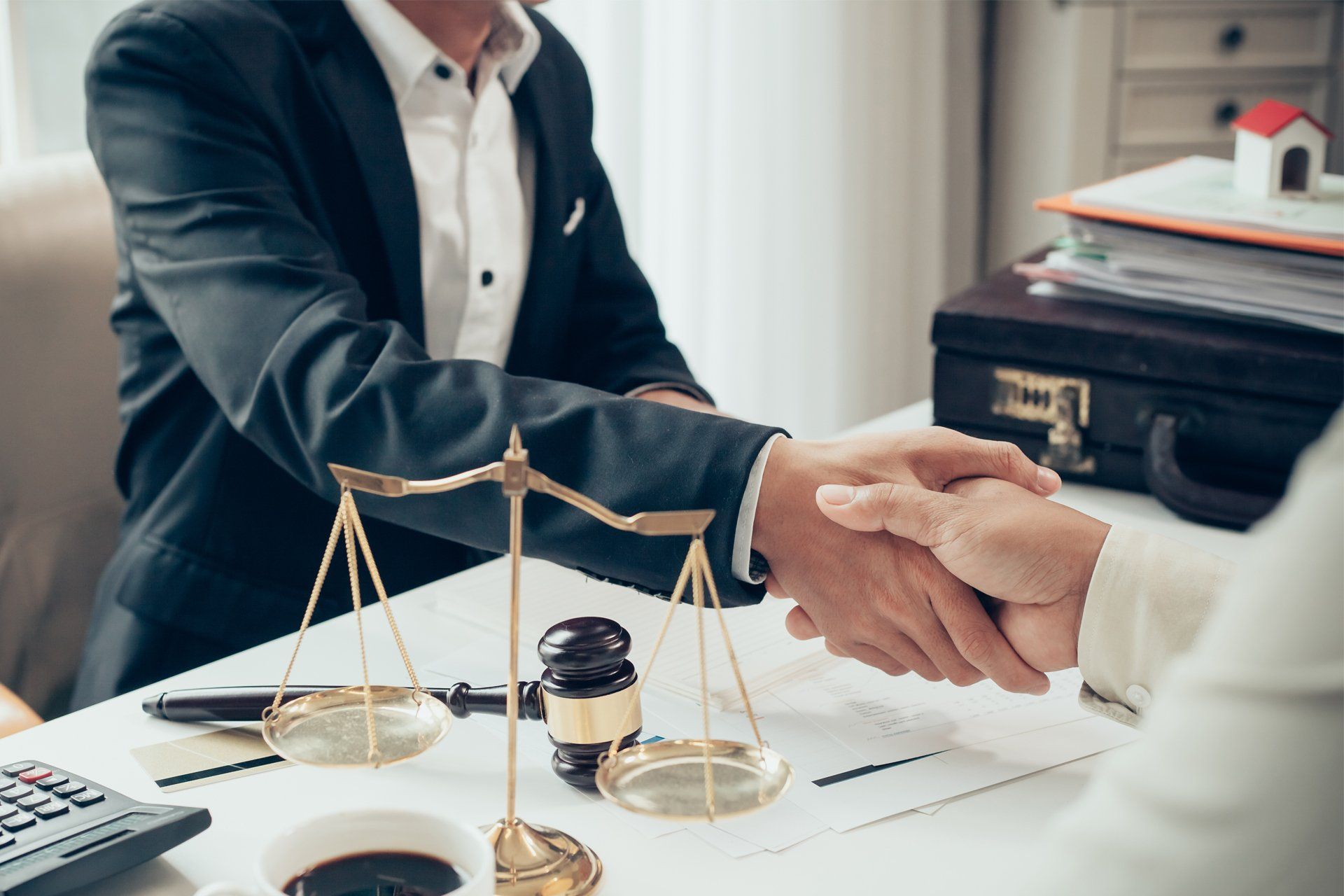 Lawyer and Client Shaking Hands