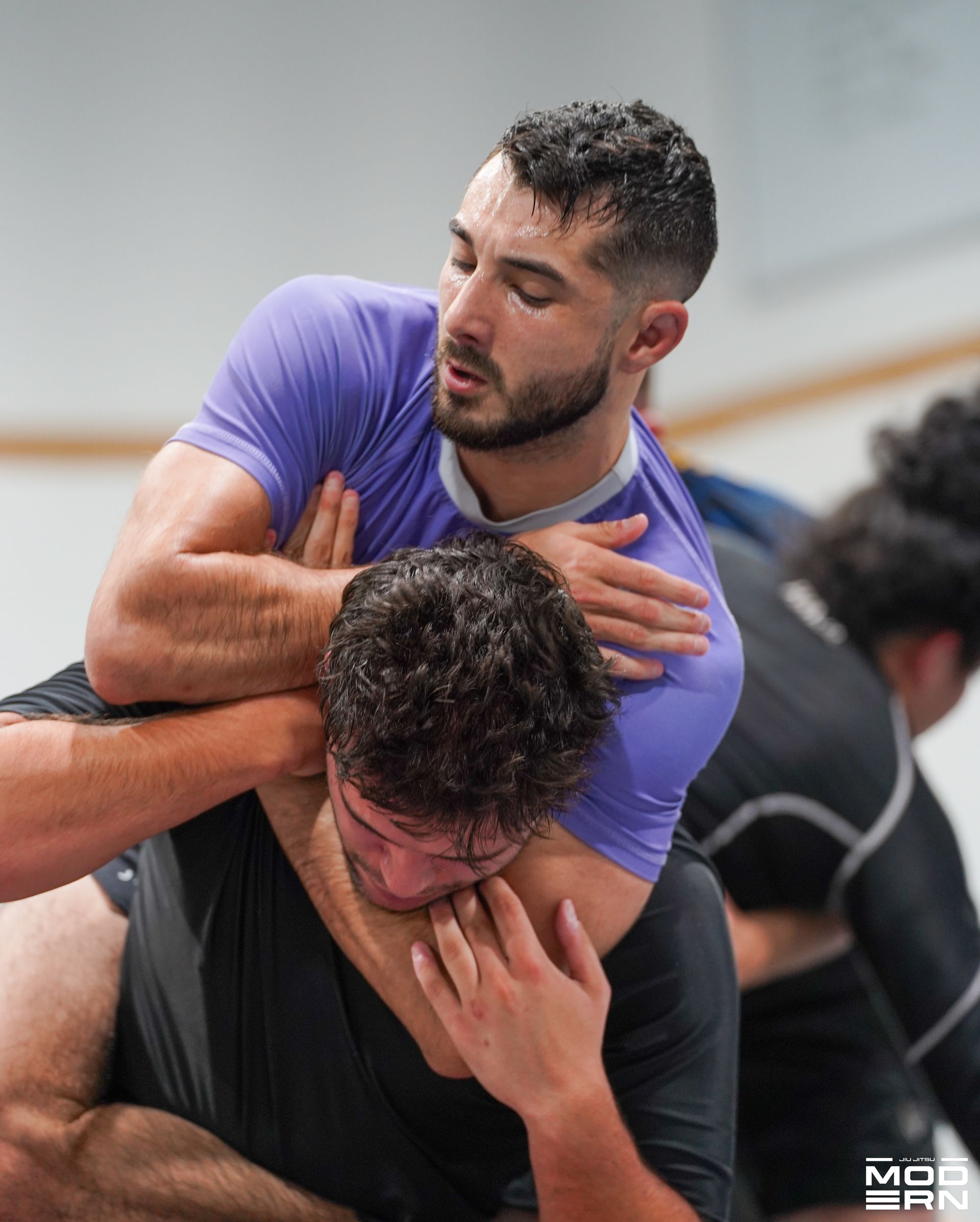 Adults drilling Brazilian Jiu-Jitsu at Jiu-Jitsu Modern in North Babylon, NY, building daily energy and focus.