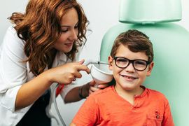 Hearing Evaluation — Boy Having His Ear Checked by the Doctor in Leavenworth, KS
