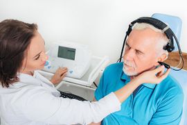 Audiologists — Elder Man Undergoing Hearing Test in Leavenworth, KS