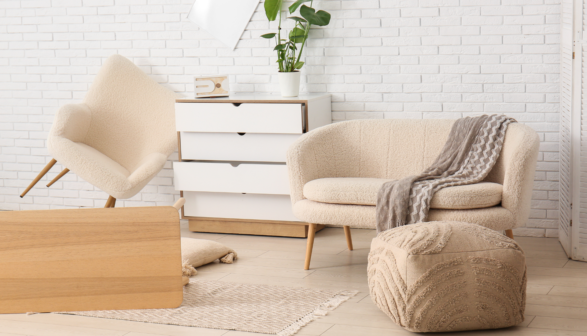 Family outdoors, smiling and talking; man gesturing, elderly man sitting, young girl, and blonde women.