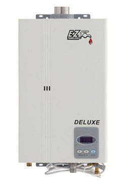 A white water heater with the word deluxe on it