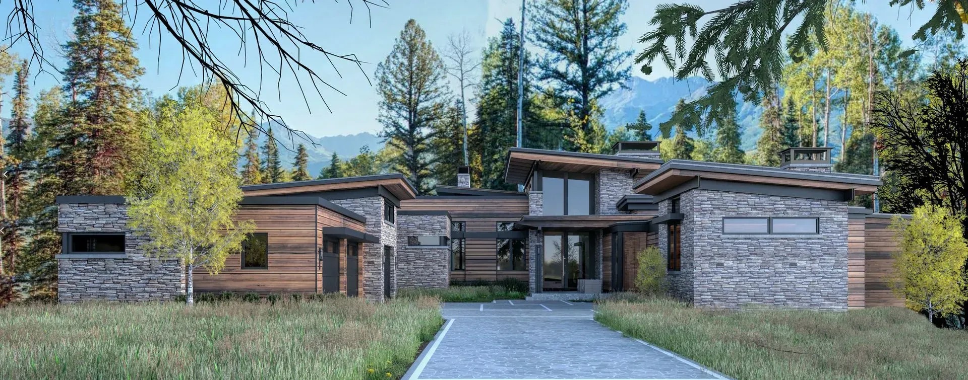 A modern home with stone and wood exterior sits among trees. A stone walkway leads to the entrance.