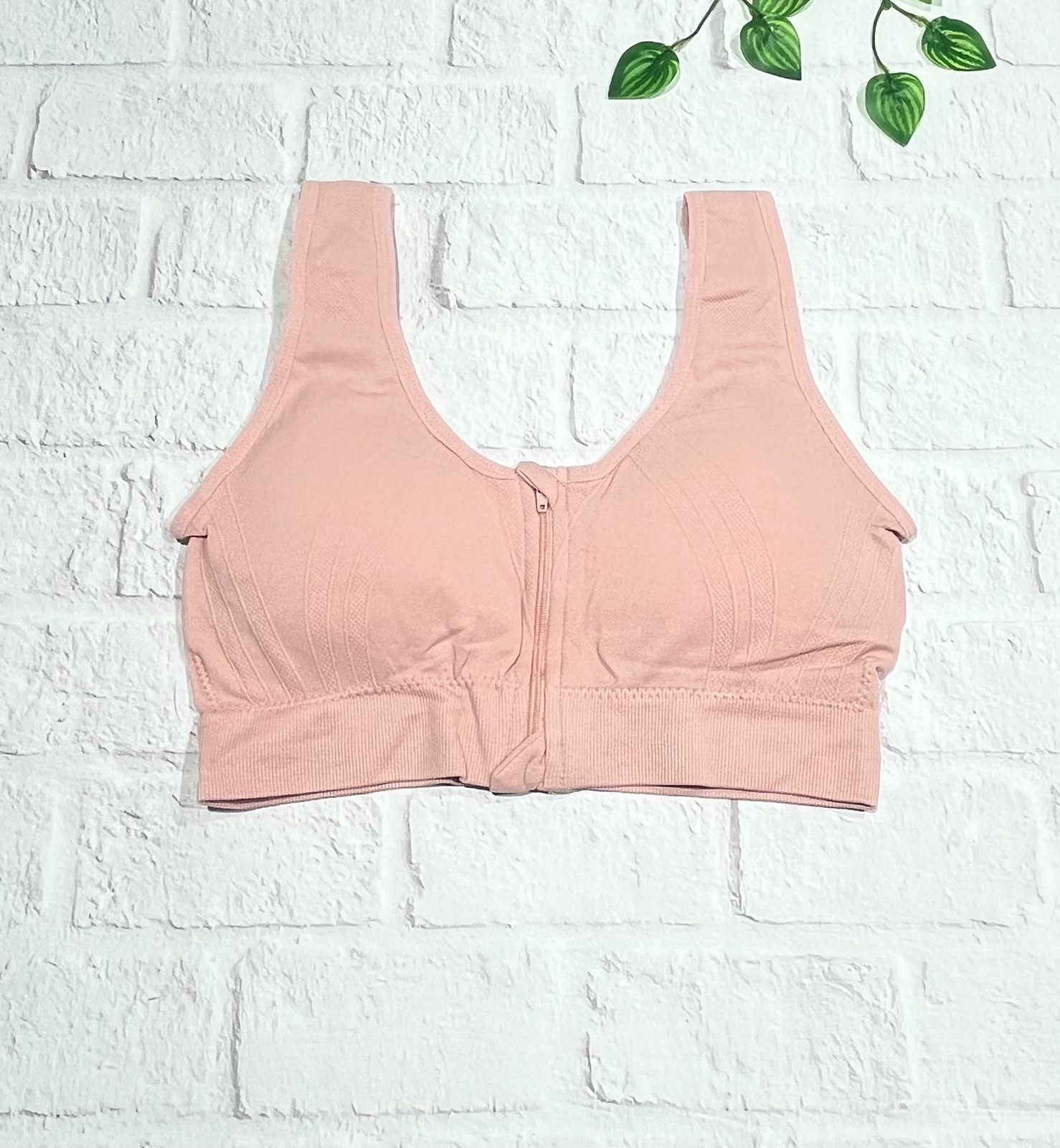 Top con cierre rosa