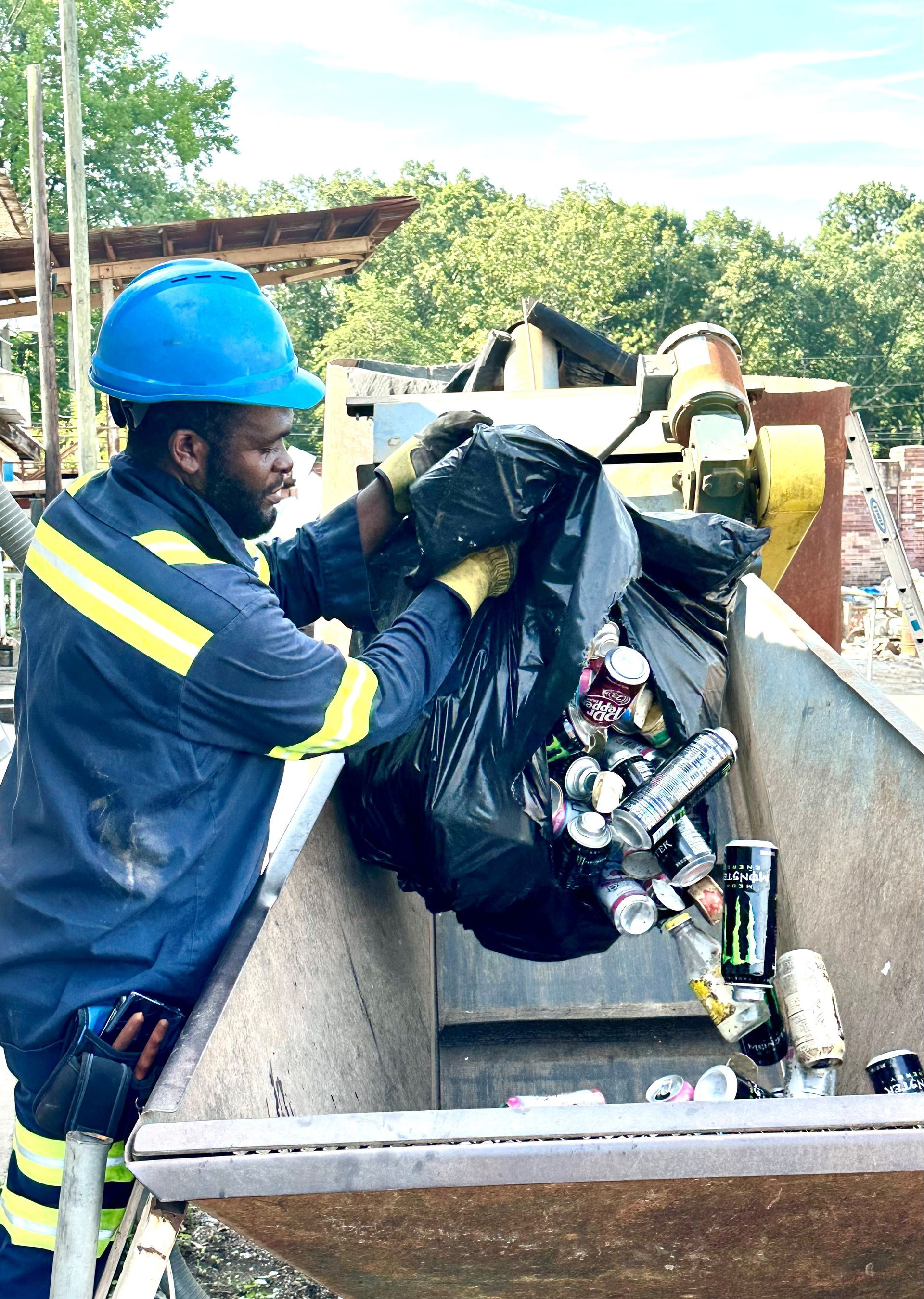 Metal Junkyard with Hydraulic Claw Machine — Salisbury, NC — Holmes Iron & Metal Inc.