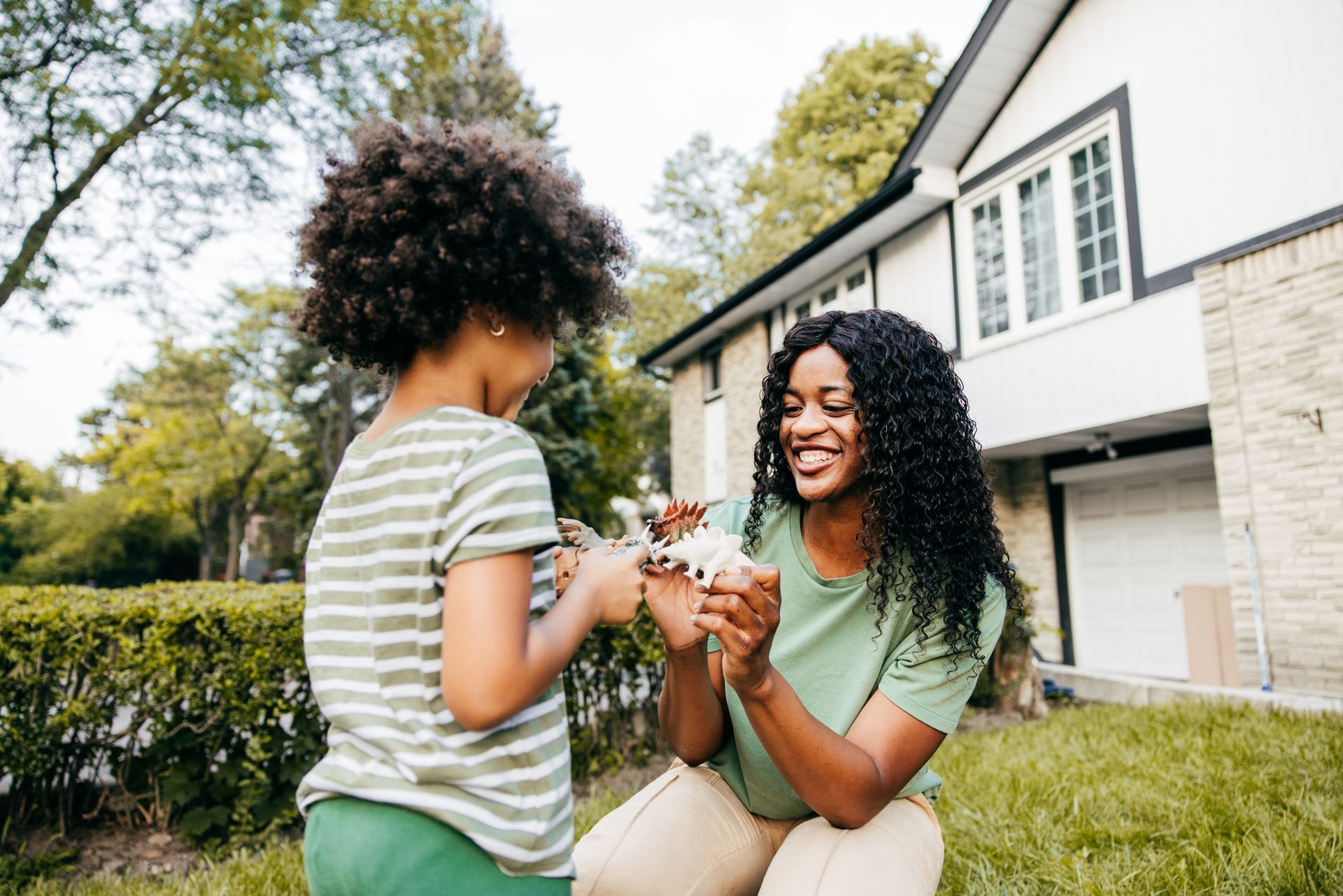 Family Playing with Toy Dinosaurs — Tucker, GA — Crocodile Dave Pest Control