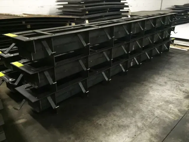 A row of black metal boxes stacked on top of each other