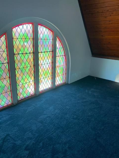 A Room With A Stained Glass Window And A Blue Carpet —  Cabonne Carpets In Molong, NSW