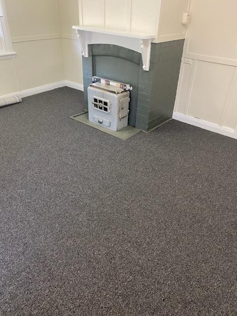 There Is A Fireplace In The Middle Of The Room —  Cabonne Carpets In Molong, NSW
