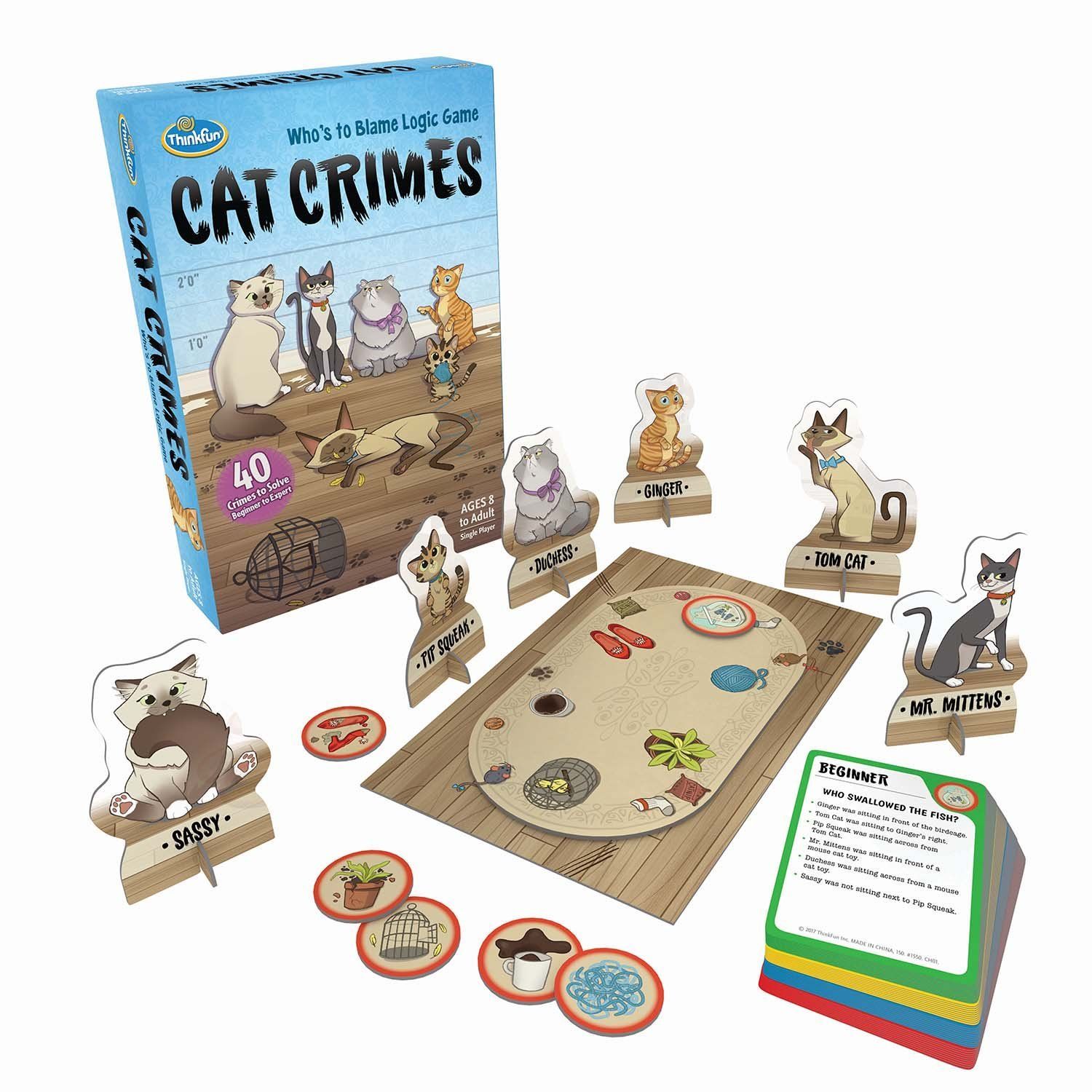 Cat Crimes board game components: box, cats, evidence tokens, crime scene mat.