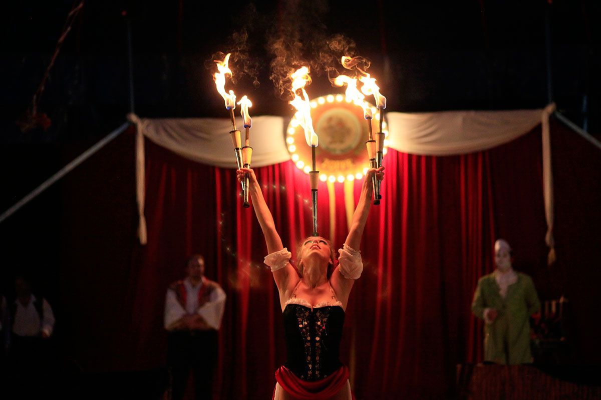 Gena juggling fire during her act in Oak Forest. The crowd gasped every time she performed.