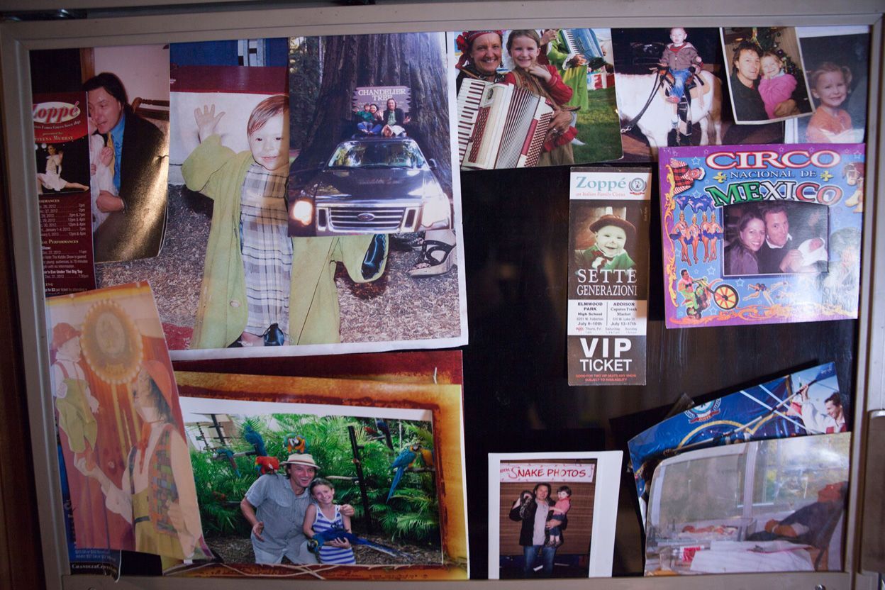Photos and tickets decorate Giovanni's trailer. 