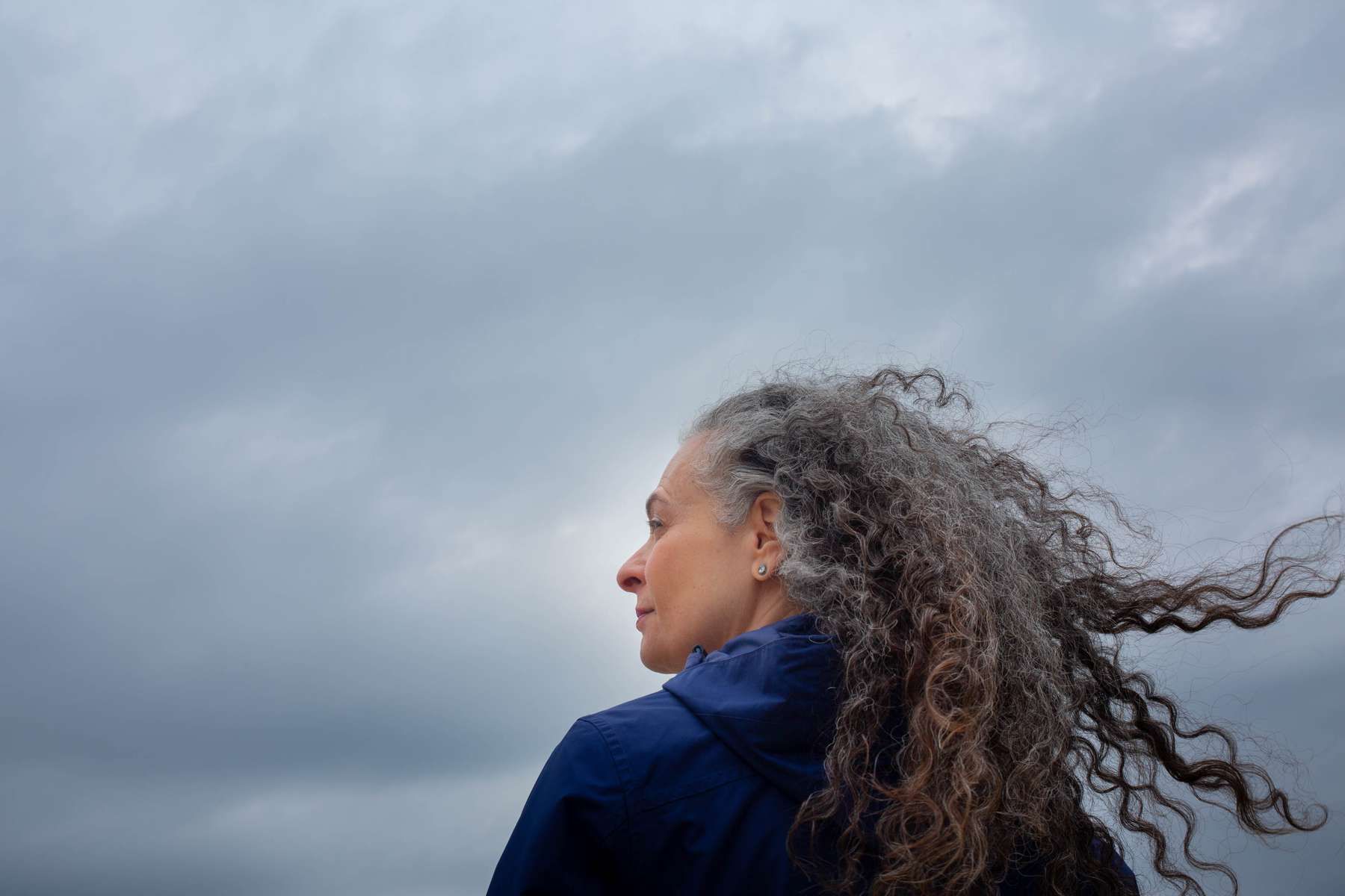 Portrait of a woman against the sky in Chicago.