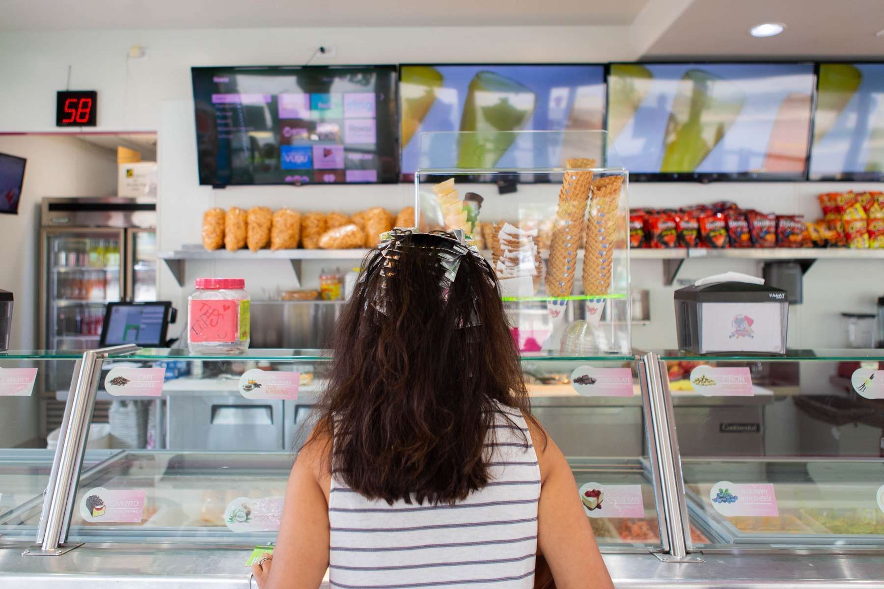 woman dying her hair ordering ice cream
