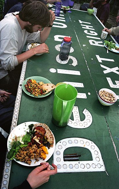 A Denison University sign serves as a table at the Homestead in Granville, Ohio. The Homestead is an 'alternative to the dorms' of Denison University, but it is not easy to become part of this self-contained living community. Applicants must write essays and go through an interview process before being accepted.
