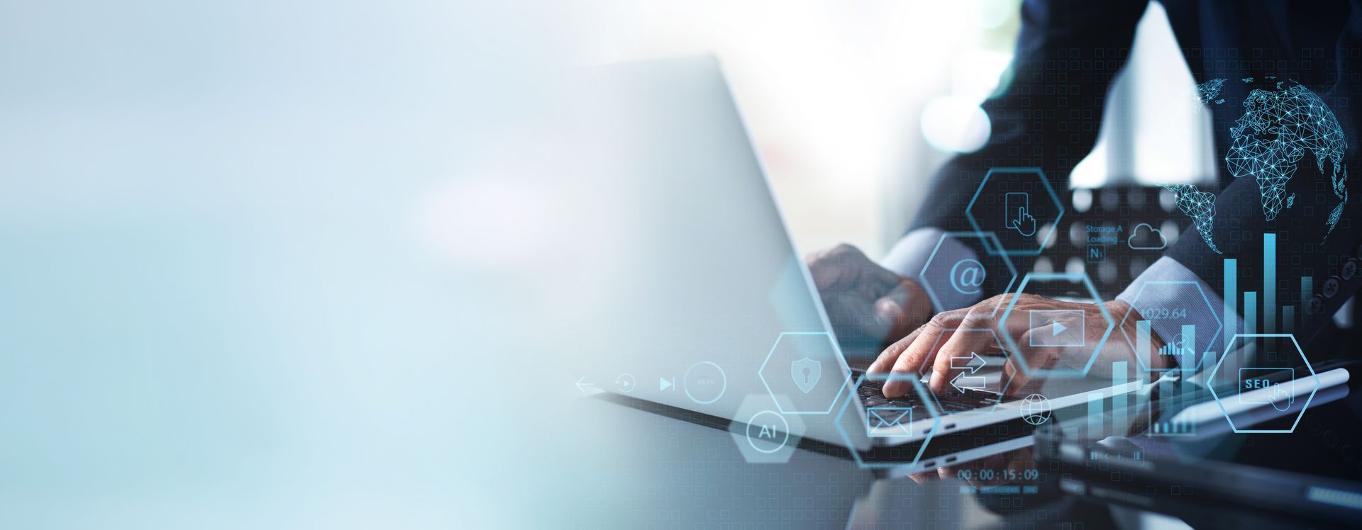 Person using a laptop with data visualization overlay, possibly analyzing information.