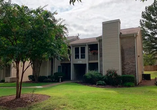 WHISPERING OAKS CONDOMINIUMS