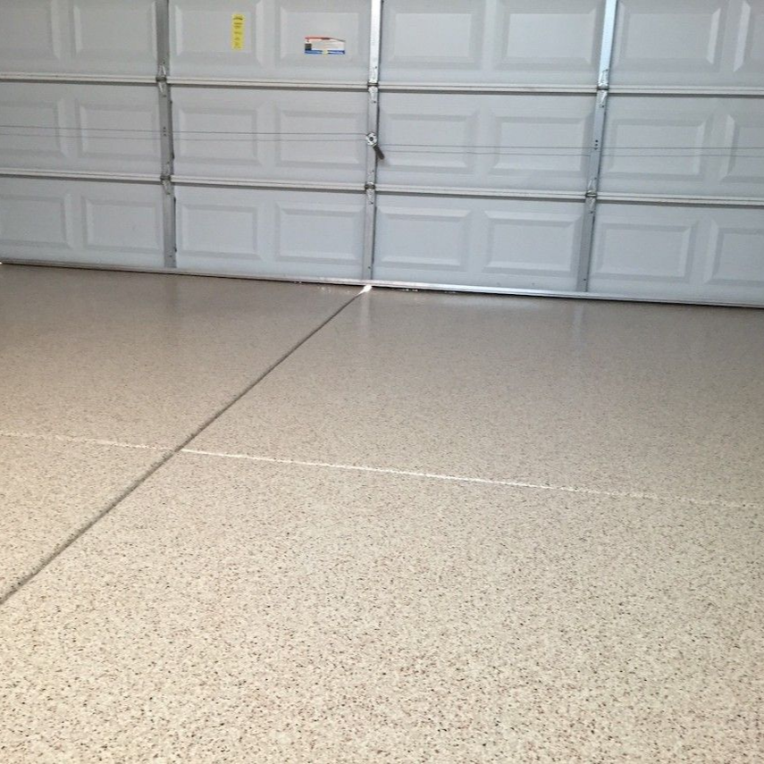 Flake garage floor coating installed in a residential garage in Avon, Ohio.