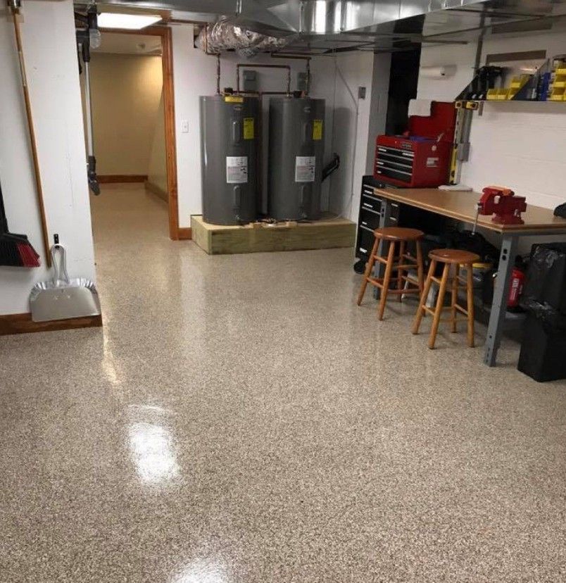 Flake epoxy flooring installation in Pleasant Valley Rd basement