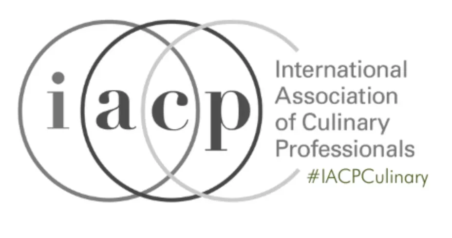 Logo for the International Association of Culinary Professionals. Overlapping circles with 