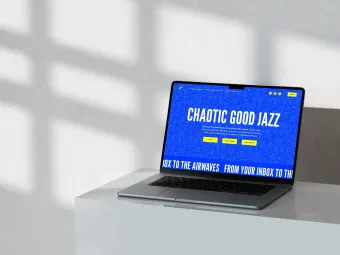 Laptop displaying a website for