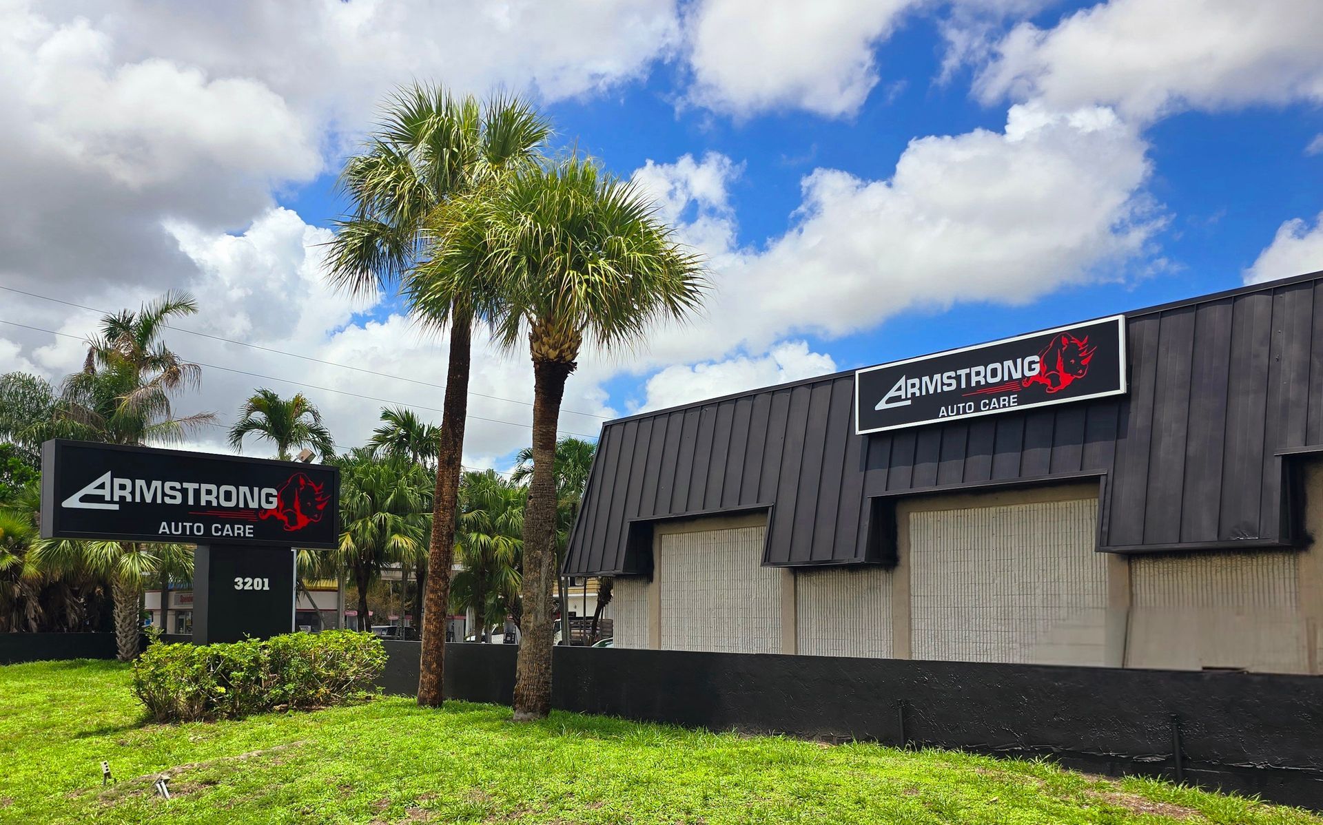 Building With Palm Trees In Front | Armstrong Auto Care