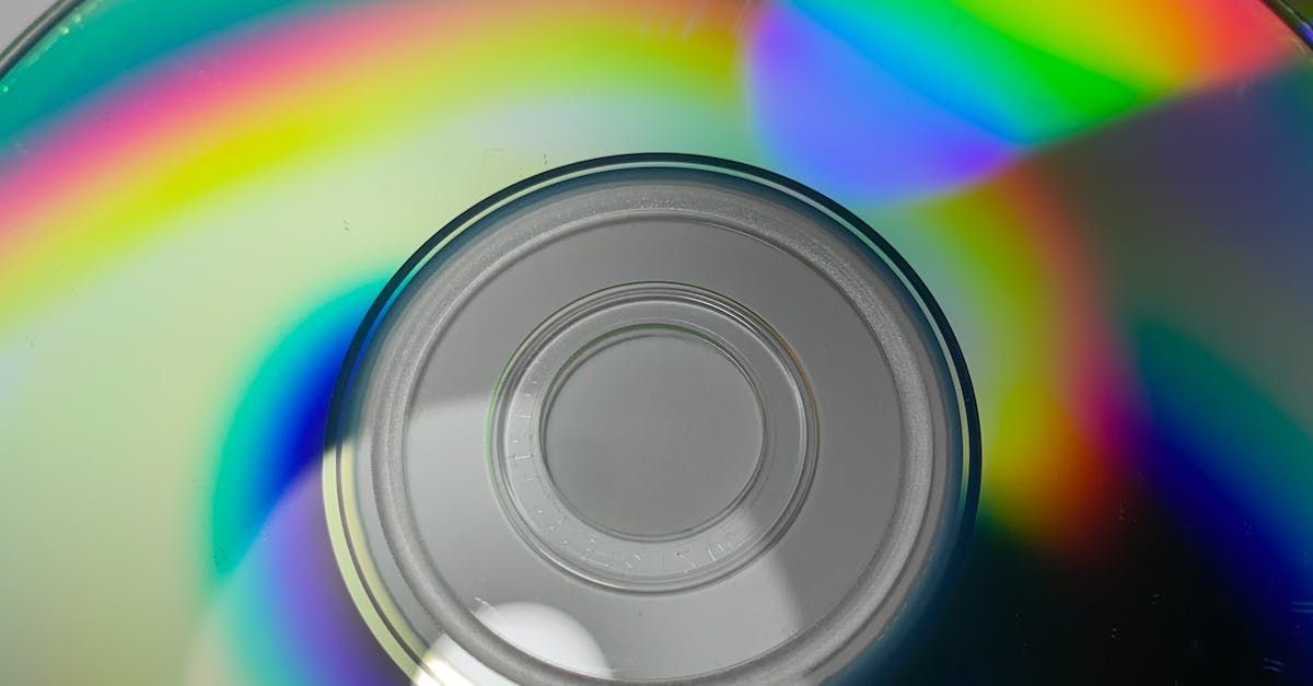A close up of a cd with a rainbow of colors