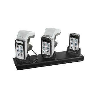 Three handheld devices on a black charging dock, silver and black, arranged side by side.