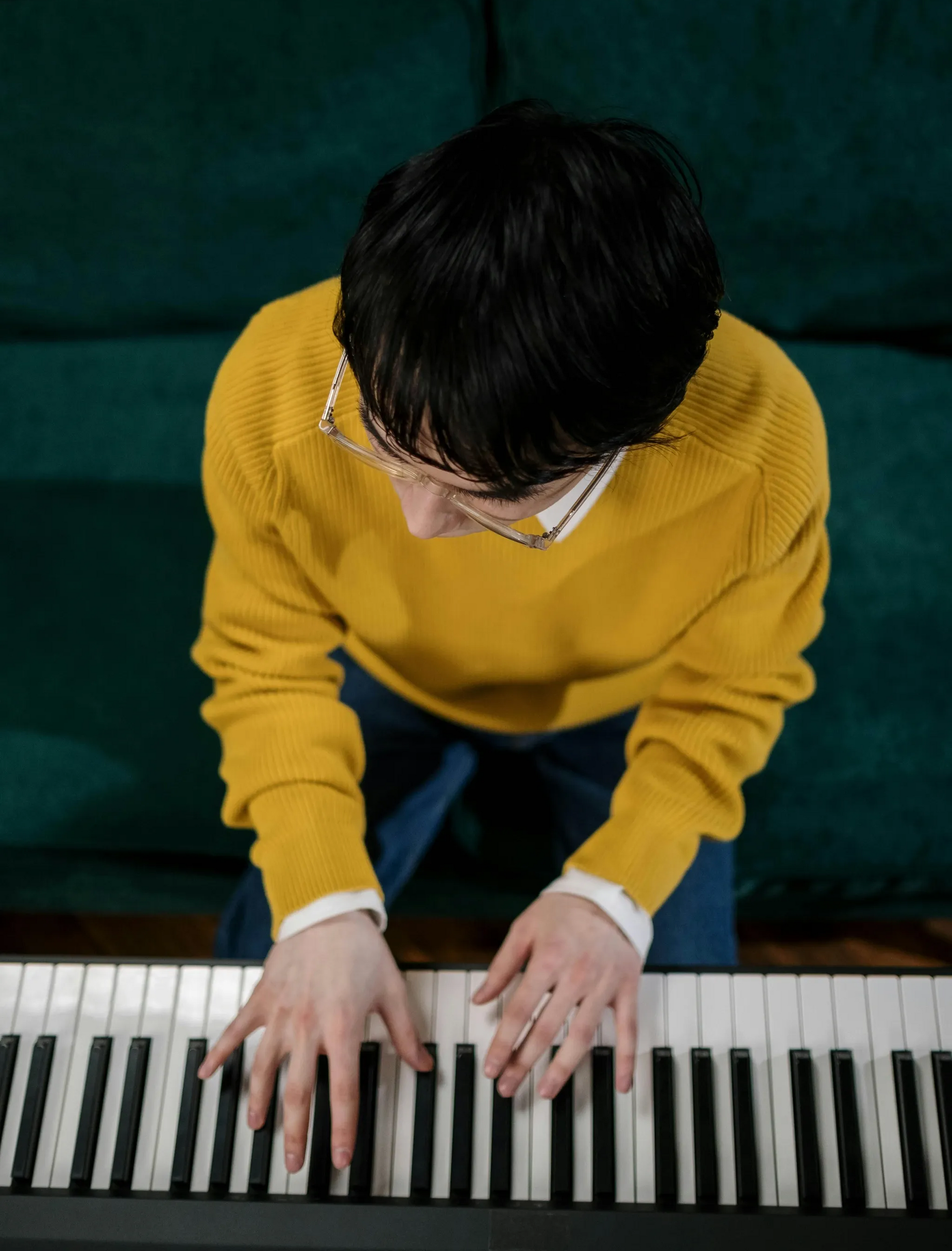 Person playing a piano.