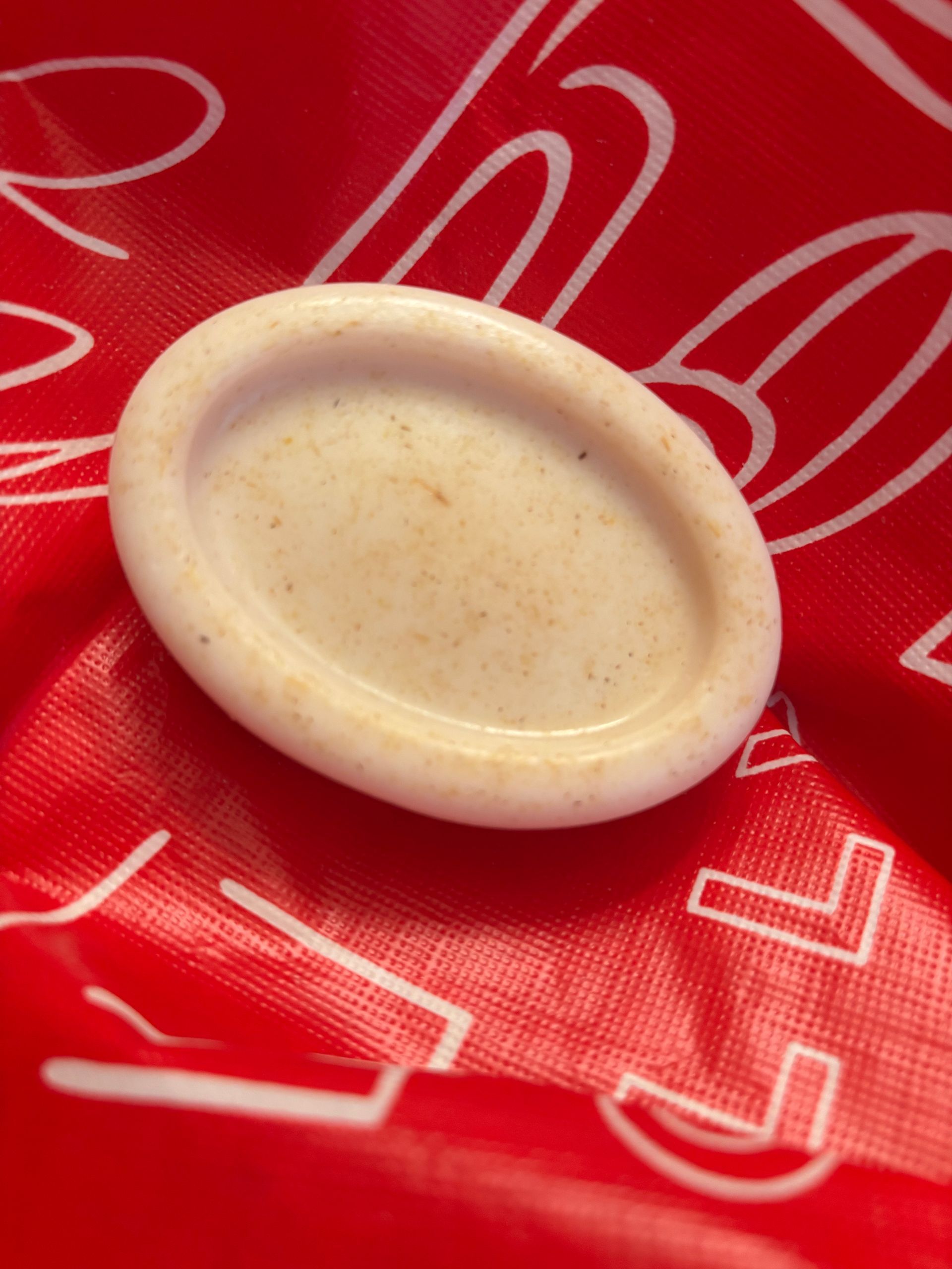 Cream-colored oval soap