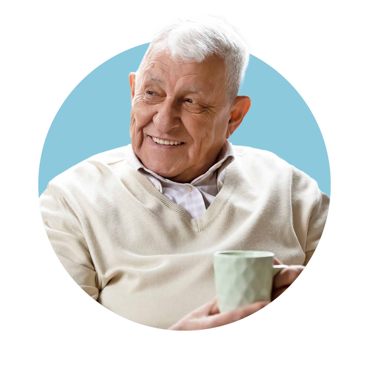 Elderly male smiling holding a cup of tea