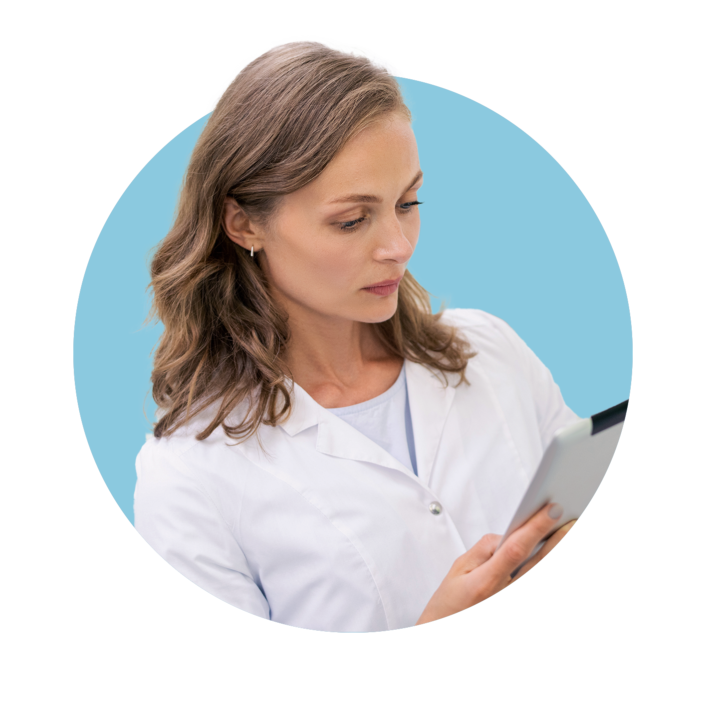 Nurse holding and looking at information on her tablet
