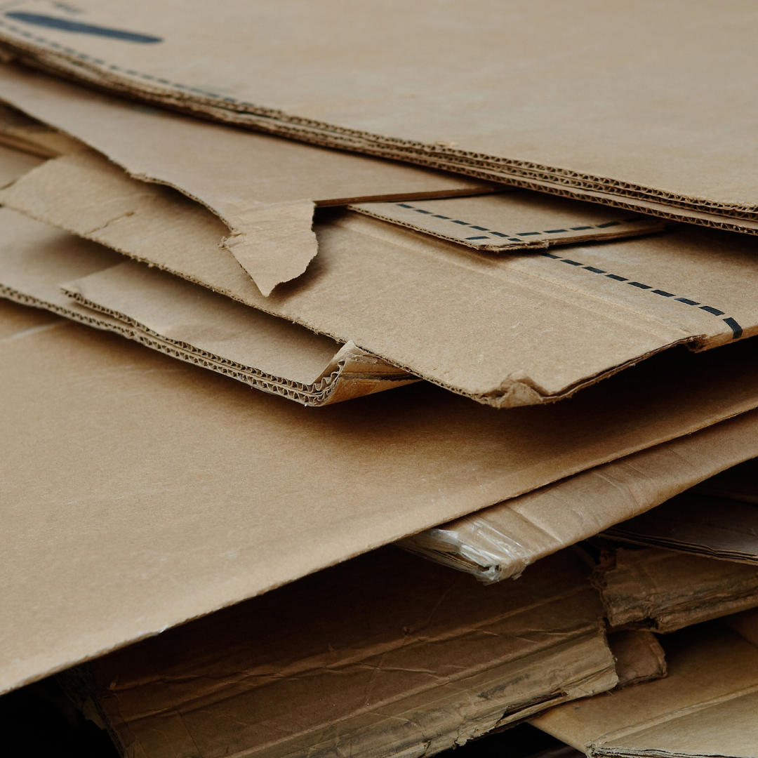 A pile of cardboard boxes stacked on top of each other