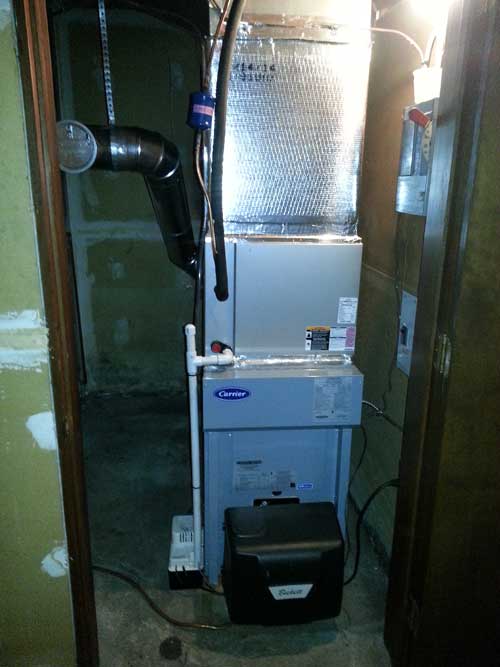 A carrier air conditioner is installed in a basement
