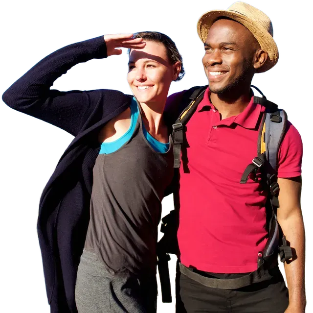 Couple hiking outdoors, looking ahead, smiling. Woman shielding eyes, man wearing backpack and hat.