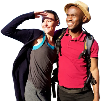 Couple hiking outdoors, looking ahead, smiling. Woman shielding eyes, man wearing backpack and hat.