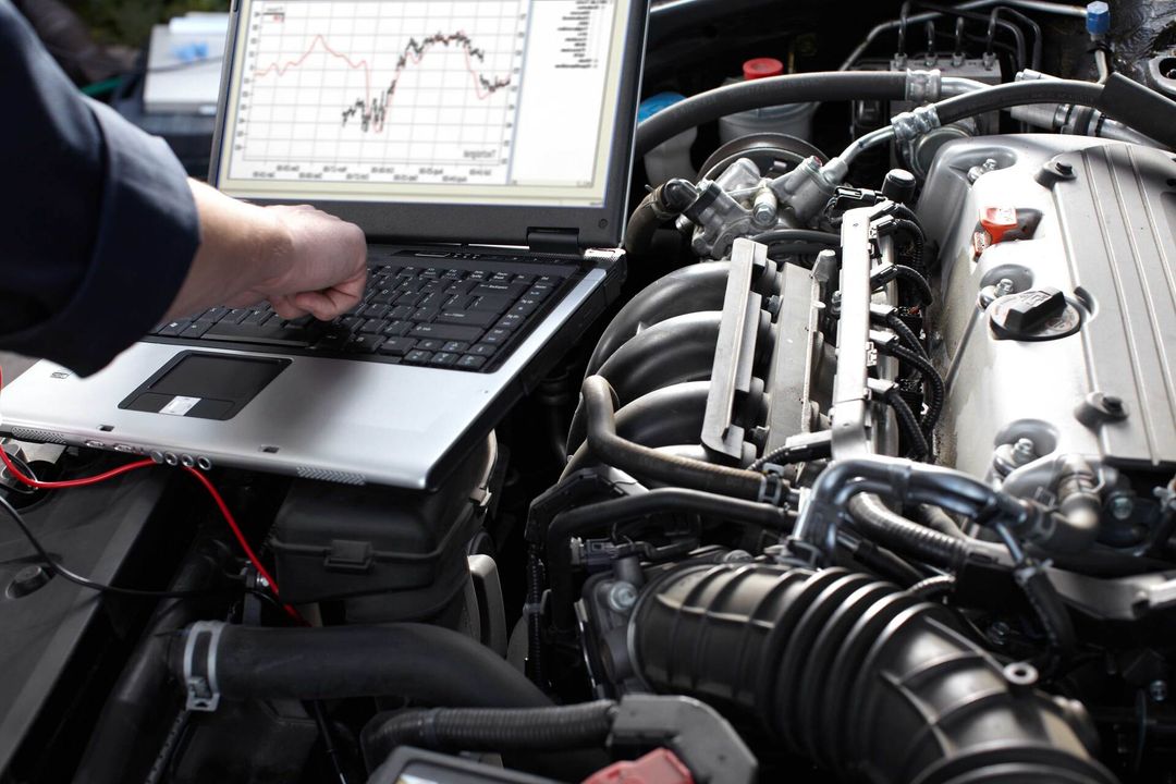 Mechanic Working on Car Engine — Car Repairs in Cardiff, NSW